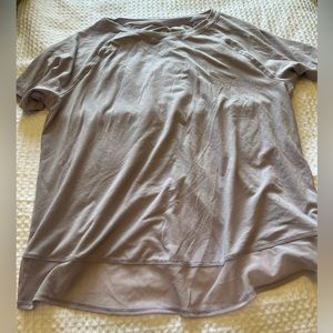 Lavender T-shirt with crisscross detail on the back and mesh